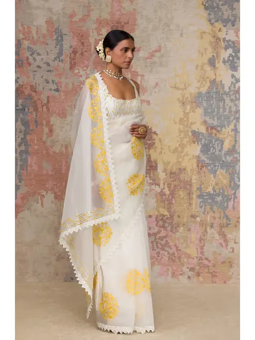 Ivory Yellow Silk Organza Saree with Stitched Blouse